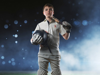 young cricket player green screen portrait